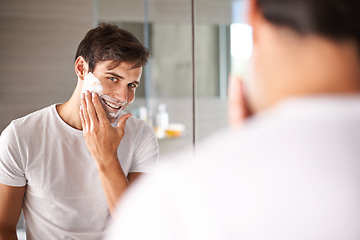 Image showing Mirror, shaving and portrait of man in bathroom for facial grooming, wellness and beauty at home. Health, skincare and happy male person with shave foam for face hygiene, cleaning and hair removal