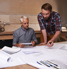 Image showing Architecture men, planning and blueprint with tablet for discussion, construction or vision in workshop. Senior man, young male partner and talking with paperwork, property or real estate development