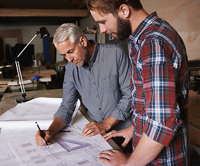 Image showing Carpenter men, teamwork and drawing on paper with discussion, construction and design in workshop. Senior man, young male partner and paperwork for building, collaboration or woodworking company