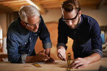 Image showing Carpentry, men and measurement in workshop teaching and learning furniture design, manufacturing or internship. Mentorship, carpenter or apprentice at sustainable wood business or teamwork on project