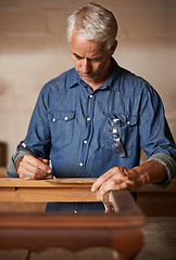 Image showing Carpentry, furniture design and man with pencil, measurement and designer wood manufacturing workshop. Creativity, small business and professional carpenter planning sustainable restoration project.