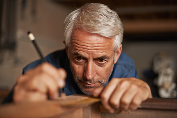 Image showing Carpentry, measurement and focus, man with pencil, ruler and professional furniture manufacturing workshop. Creativity, small business and expert carpenter planning sustainable wood project design.