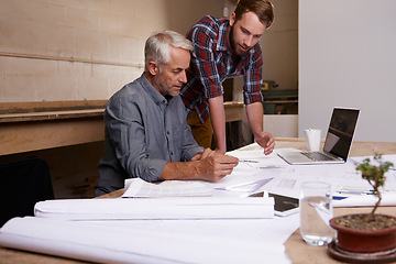 Image showing Architect, teamwork and men with blueprint in workshop for collaboration. Senior engineer, design and father and son planning, discussion and working on building project of apprentice with mentor.