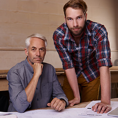 Image showing Architecture, teamwork and portrait of men in workshop with blueprint for building construction. Senior engineer, serious father and son working on design, project and plan of apprentice and mentor.