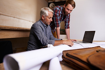 Image showing Architects, teamwork and men with blueprint in workshop for building construction. Senior engineer, father and son working on design, project and planning of apprentice and mentor with paperwork.