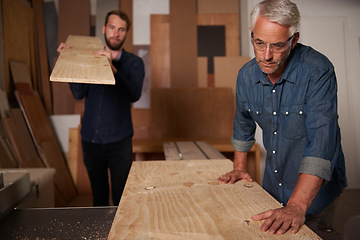 Image showing Carpentry, carpenter and men in team in workshop, design project with vocation and creative DIY skill. Teamwork, collaboration and male employee with wood beam, father and son working together