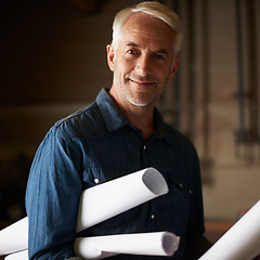 Image showing Senior architect, blueprint and man with smile in portrait, renovation or remodeling project with floor plan. Architecture industry, engineer and male professional designer with vision and mission