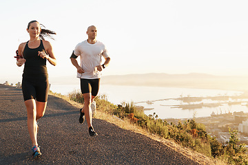 Image showing Morning, fitness and couple running as exercise or workout for health and wellness together in sunrise. Sport, man and woman runner run with athlete as training listening to sports music for energy