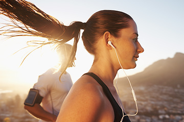 Image showing Sunrise, streaming and woman running as exercise or morning workout for health and wellness together. Sport, man and runner run with athlete while training and listening to sports music for energy