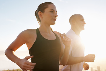 Image showing Sunrise, fitness and happy couple running as exercise, performance and morning workout for heath and wellness in nature. Sport, energy and people training for a marathon or sports health together