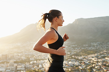 Image showing Running, fitness and woman with balance, exercise and cardio with healthy lifestyle, wellness and workout. Female person, runner and athlete outdoor, view and target with performance, goal and sports