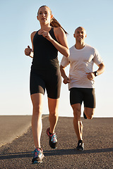 Image showing Road, training and personal trainer running with woman as workout or morning exercise for health and wellness. Sport, man and street runner with athlete as fitness for a marathon, sports and energy