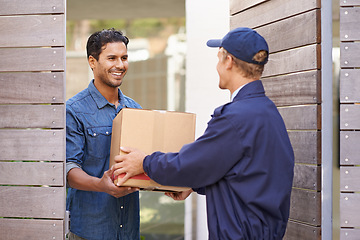 Image showing Man, courier and home for giving package, ecommerce or delivery with smile, customer experience or outdoor. Logistics service, shipping and guy with gratitude, happy and receiving box at house door