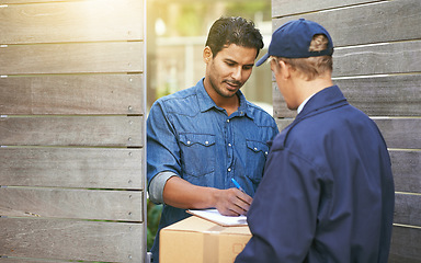 Image showing Man, sign paperwork and home for box, ecommerce or delivery with writing, customer experience pr outdoor. Logistics service, e commerce and guy with signature, pen and document for package at house