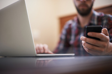 Image showing Laptop, search and hand of man and phone for communication, social media and contact. Text message, internet and technology with male person and typing on mobile for connection, online and app