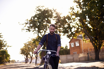 Image showing Bicycle, transport and man in road walking with lens flare for exercise, commute and cycling in morning. Travel, city and male cyclist with bike for eco friendly traveling, carbon neutral and journey