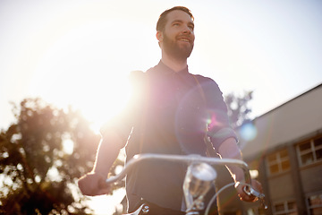 Image showing Travel, happy and man with bicycle walking in road with lens flare for exercise, commute and cycling. Transport, morning and male cyclist for eco friendly traveling, carbon neutral bike and journey