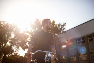 Image showing Bicycle, travel and man with lens flare happy for exercise, commute and cycling in morning. Transport, city and male cyclist with bike for eco friendly traveling, carbon footprint ride and journey