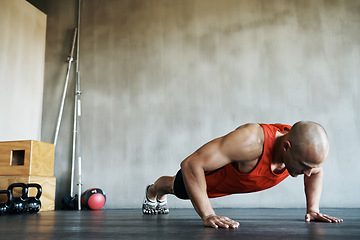 Image showing Workout, muscular and man doing gym studio push up for exercise, health performance and sports training for muscle building. Bodybuilding routine, determination or strong person doing floor pushup