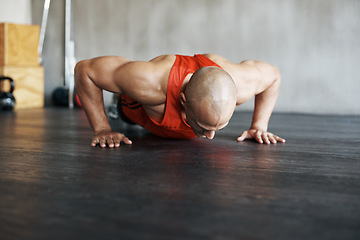 Image showing Fitness, floor exercise and man doing push up for strength workout, gym practice or bodybuilder training. Endurance challenge, discipline and strong male athlete doing studio exercises on ground