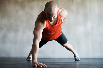 Image showing Fitness, strong man and one arm push up for gym studio exercise, bodybuilder workout or sports training. Endurance challenge, muscle building or active male athlete doing floor pushup for health goal