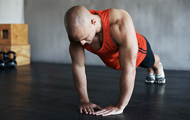 Image showing Strong, muscle and man doing strength push up for fitness lifestyle, determination or body fitness commitment. Diamond pushup, power challenge or active person workout, bodybuilding or floor exercise