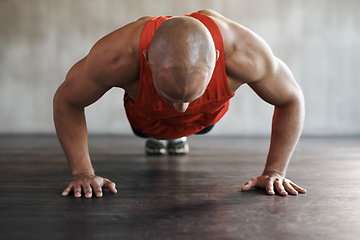 Image showing Muscle growth, strong man and floor push up for athlete fitness lifestyle, studio challenge or health goals commitment. Strength, muscular or active person workout, bodybuilding or exercise on ground