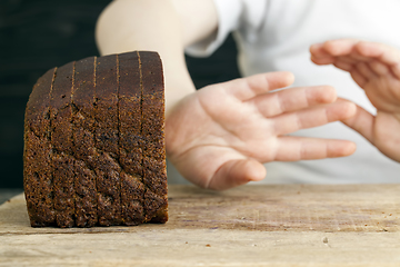 Image showing sliced black rye bread