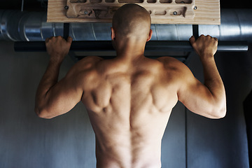Image showing Strength exercise, pull up and man doing on muscle building workout, athlete training or bodybuilding fitness. Commitment, muscular and strong back of sports person working on power performance