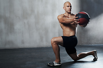 Image showing Medicine ball, gym or serious man focus on fitness workout for body health, core muscle building and strength performance. Determination, training motivation or mockup person with exercise equipment