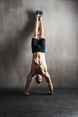 Image showing Fitness body, wall and man doing handstand for muscle workout, balance focus or health club exercise. Gym training, hand stand and strong person, athlete or sportsman doing push up challenge