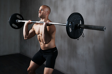 Image showing Fitness, man and weightlifting with barbell for workout, exercise or training at the gym. Fit, active and strong muscular male lifting weight for intense strength exercising, power or bodybuilding