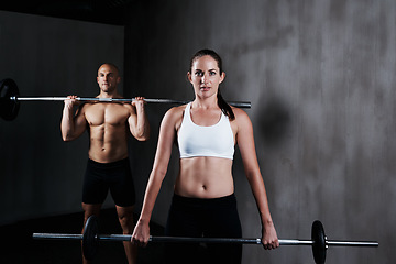 Image showing Fitness, people and weightlifting with barbell for exercise, bodybuilding or workout at gym. Portrait of fit, active and strong woman and man lifting weight for intense strength, muscle or training