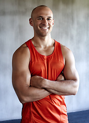 Image showing Happy man, fitness and portrait smile with arms crossed in confidence for workout, exercise or training at gym. Strong muscular male and confident personal trainer, leader or coach in bodybuilding