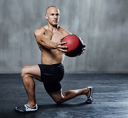 Image showing Exercise ball, gym or serious man doing fitness workout for body health, core muscle building and strength performance. Focus, training motivation or athlete person with medicine balls for exercising