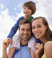 Image showing Family, sky and smile portrait outdoor while happy for travel, fun or holiday in summer. Face of man, woman and child or son together on vacation or adventure in nature with happiness, love and care