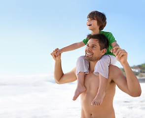 Image showing Family, father and child at beach for summer travel or holiday with a smile for blue sky and space. A man and kid playing together outdoor on vacation at sea while holding hands, happy and excited