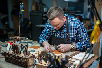 Image showing Concept of handmade craft production of leather goods.