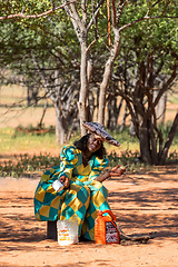 Image showing herero woman with child in the village