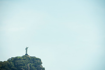 Image showing Brazil, statue and Christ the Redeemer on sky background for tourism, sightseeing and global destination. Travel mockup, Rio de Janeiro and drone view of monument, sculpture and landmark on mountain