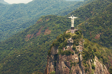 Image showing Brazil, landscape and aerial of Christ the Redeemer on hill for tourism, sightseeing and travel destination. Traveling, Rio de Janeiro and drone view of statue, sculpture and landmark on mountain