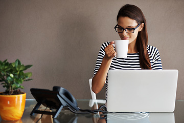 Image showing Coffee, laptop and happy business woman smile in office with mockup space on wall background. Tea, research and female worker online for planning, browsing and creative, inspiration and technology