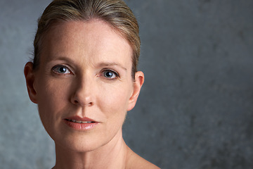 Image showing Mature woman, dermatology and portrait with natural beauty and cosmetic dermatology. Isolated, gray background and female person face with facial treatment and skincare with anti aging cosmetics