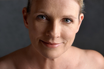 Image showing Face, smile and portrait of mature woman doing beauty cosmetic skincare isolated in a black studio background. Cosmetics, care and old female model calm with natural skin due to anti aging