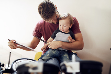 Image showing Father, baby and child drum lesson with music development and learning. Home, dad and papa bonding with youth smile and instrument together with kids teaching, love and parent care at a family house