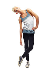 Image showing Young teenager, studio or portrait with attitude, fashion and gen z aesthetic or confident by white background. Isolated guy, model or teen with trendy clothes, lifestyle or youth culture by backdrop