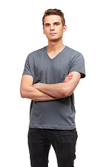 Image showing Fashion, crossed arms and serious portrait of man with confidence, attractive and pride on white background. Studio, confident and face of isolated handsome male person with trendy casual clothes