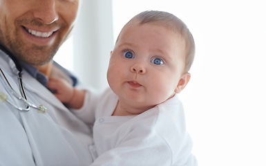 Image showing Funny, face and baby with pediatrician in hospital for medical support and growth in portrait. Cute newborn kid, pediatrics doctor and healthcare service, expert consulting and clinic for children