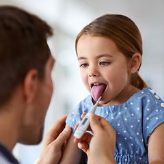 Image showing Kid, doctor and thermometer to check fever in mouth for medical risk, covid infection and help. Pediatrician, sick girl and temperature test of children, flu virus and healthcare consulting in clinic