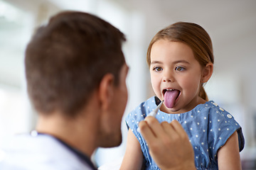 Image showing Kid, doctor and thermometer in mouth at hospital of medical risk, covid infection and fever. Pediatrician, sick girl and testing temperature of children, flu virus and healthcare consulting in clinic